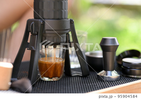 Close-up shot of Slowbar coffee maker. Close-up shot of Slowbar coffee maker. 95904584