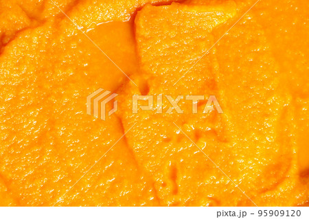 Preparation zucchini caviar. Stewed vegetables zucchini, with carrots and tomato paste, are cooked on the stove. Texture Preparation zucchini caviar. Stewed vegetables zucchini, with carrots and tomato paste, are cooked on the stove. Texture 95909120