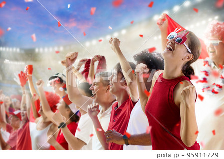 Football team supporter. Stadium in red and white. Football team supporter. Stadium in red and white. 95911729