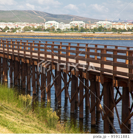 Istanbul Turkey Tuzla Kamil Abdus Lake, wooden pier and surrounding residential areas, 30 August 2022 Istanbul Turkey Tuzla Kamil Abdus Lake, wooden pier and surrounding residential areas, 30 August 2022 95911881