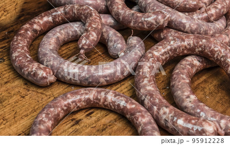 Homemade sausages preparation, Patagonia, Argentina 95912228