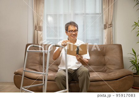 Sarcopenia older man is reading a book for relax at nursinghome . Sarcopenia is a degenerative disease of the muscle usually caused by the natural consequence of aging. Sarcopenia older man is reading a book for relax at nursinghome . Sarcopenia is a degenerative disease of the muscle usually caused by the natural consequence of aging. 95917083