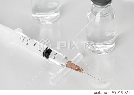 Medicine vials and syringes in the laboratory- Health Beauty and medical concepts- Isolated on white background 95919025