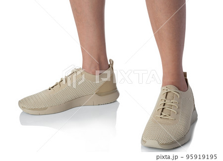 Men wearing sneakers shoes standing pose of side view isolated on white background Men wearing sneakers shoes standing pose of side view isolated on white background 95919195