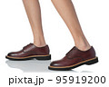Men wearing leather shoes stepping pose of side view isolated on white background 95919200