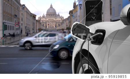 Progressive electric car recharging battery at the charging station in Vatican. 95919855