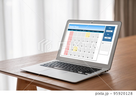 Calendar on computer software application for modish schedule planning Calendar on computer software application for modish schedule planning 95920128
