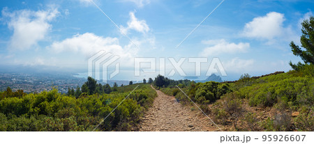La Ciotat, France - May 18th 2022: View towards the bay of La Ciotat with its famous rocks 95926607