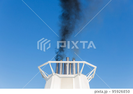 smoke from the ship's chimney of a cruise ship 95926850