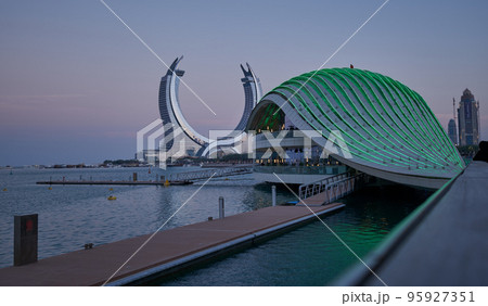 Lusail city, Qatar : Katara Towers project in Lusail marina sunset view .Construction industry concept. Lusail city, Qatar : Katara Towers project in Lusail marina sunset view .Construction industry concept. 95927351