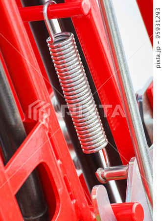 Hard spring made of steel. Part and detail of industrial or agricultural machine 95931293
