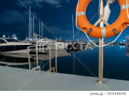 many ships at night on the pier in the Aegean Sea Athens Greece many ships at night on the pier in the Aegean Sea Athens Greece 95938648