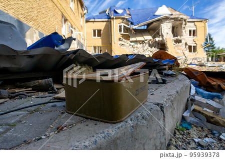 destroyed and burned houses in the city during the war in Ukraine 95939378