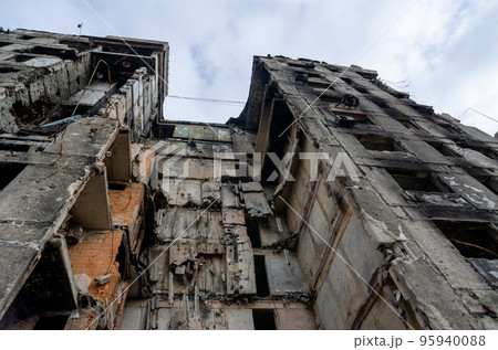 destroyed and burned houses in the city during the war in Ukraine destroyed and burned houses in the city during the war in Ukraine 95940088