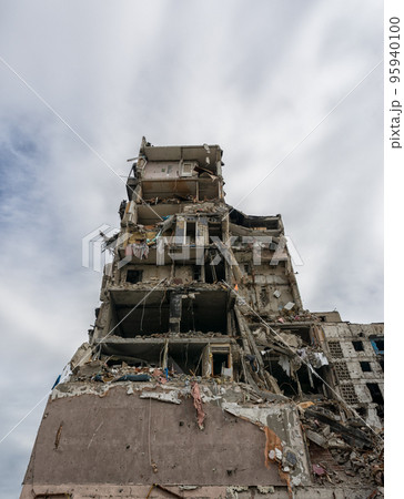 destroyed and burned houses in the city during the war in Ukraine destroyed and burned houses in the city during the war in Ukraine 95940100