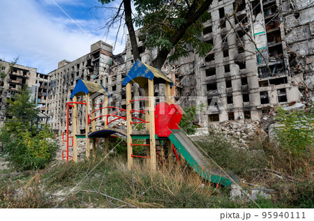 destroyed and burned houses in the city during the war in Ukraine destroyed and burned houses in the city during the war in Ukraine 95940111