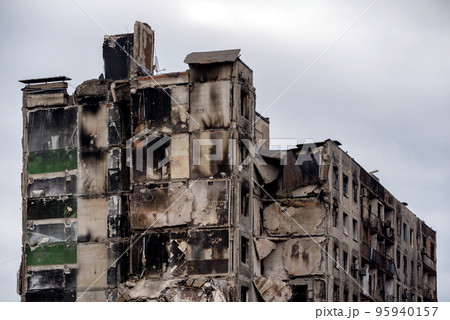 destroyed and burned houses in the city during the war in Ukraine destroyed and burned houses in the city during the war in Ukraine 95940157