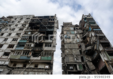 destroyed and burned houses in the city during the war in Ukraine destroyed and burned houses in the city during the war in Ukraine 95940349