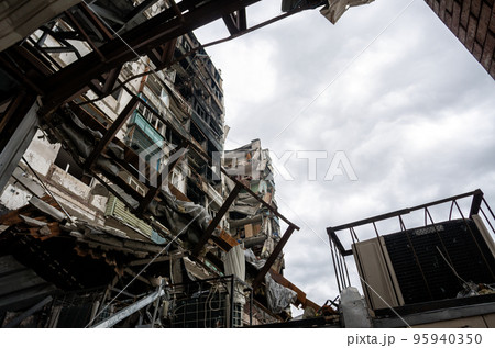 destroyed and burned houses in the city during the war in Ukraine 95940350