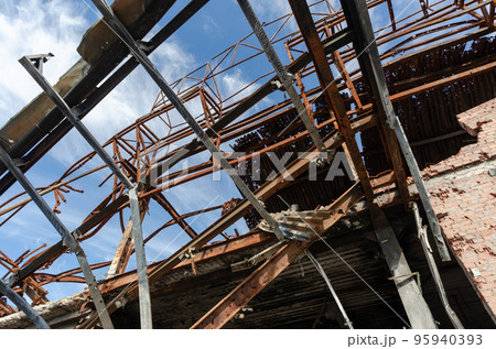 destroyed and burned houses in the city during the war in Ukraine destroyed and burned houses in the city during the war in Ukraine 95940393