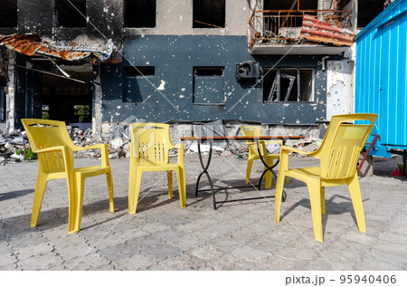 destroyed and burned houses in the city during the war in Ukraine 95940406