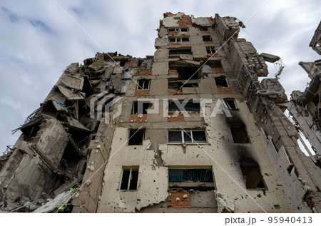 destroyed and burned houses in the city during the war in Ukraine destroyed and burned houses in the city during the war in Ukraine 95940413