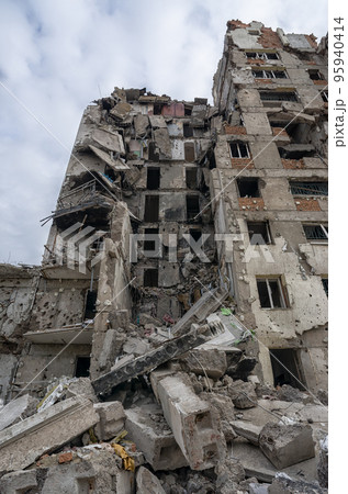 destroyed and burned houses in the city during the war in Ukraine destroyed and burned houses in the city during the war in Ukraine 95940414