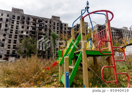 destroyed and burned houses in the city during the war in Ukraine destroyed and burned houses in the city during the war in Ukraine 95940419
