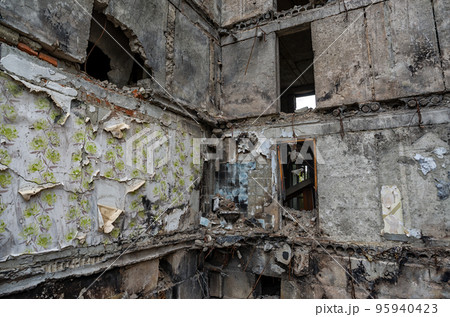 destroyed and burned houses in the city during the war in Ukraine destroyed and burned houses in the city during the war in Ukraine 95940423