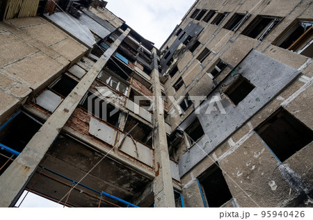 destroyed and burned houses in the city during the war in Ukraine destroyed and burned houses in the city during the war in Ukraine 95940426