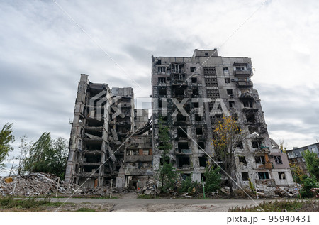 destroyed and burned houses in the city during the war in Ukraine destroyed and burned houses in the city during the war in Ukraine 95940431