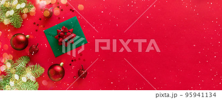 Christmas letter with greeting card and congratulations, christmas tree branches, baubles, glitter decorations on red. Merry Christmas happy New Year concept. Flat lay, banner, copy space Christmas letter with greeting card and congratulations, christmas tree branches, baubles, glitter decorations on red. Merry Christmas happy New Year concept. Flat lay, banner, copy space 95941134