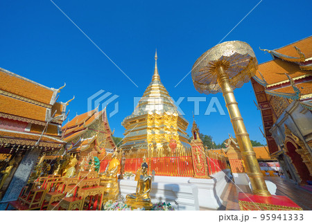 Phra That Doi Suthep, a buddhist temple. Thai architecture temple golden holy shrines light religious, Northern Chiang Mai, Thailand. 95941333