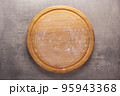 Pizza board on stone background top table. Wooden cutting board 95943368
