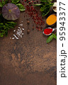 Variety of spices and herbs at table background. Cooking concept and ingredients 95943377