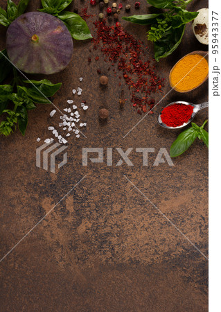 Variety of spices and herbs at table background. Cooking concept and ingredients Variety of spices and herbs at table background. Cooking concept and ingredients 95943377