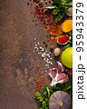 Variety of spices and herbs at table background. Cooking concept and ingredients 95943379