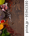 Variety of spices and herbs at table background. Cooking concept and ingredients 95943380