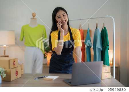 Startup small business entrepreneur of freelance Asian woman using a laptop with box Cheerful success online marketing packaging box and delivery SME idea concept Startup small business entrepreneur of freelance Asian woman using a laptop with box Cheerful success online marketing packaging box and delivery SME idea concept 95949880