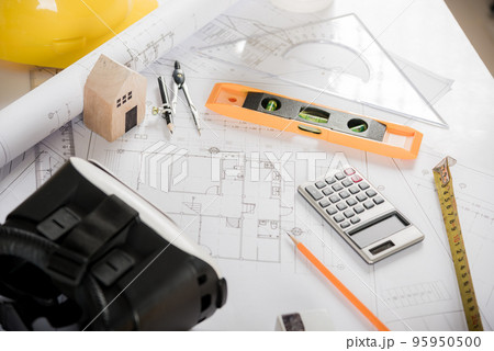 Architect workplace top view. Architectural blueprint paper project plans on desk table, tool for engineer contractor building design working drawing and VR glasses, industry virtual technology 95950500