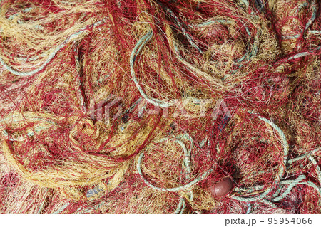 Fishing nets close up abstract background. Nylon fishing nets on a boat. 95954066