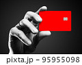 Man's hand holding credit card. 95955098