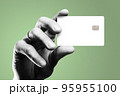 Man's hand holding credit card. 95955100