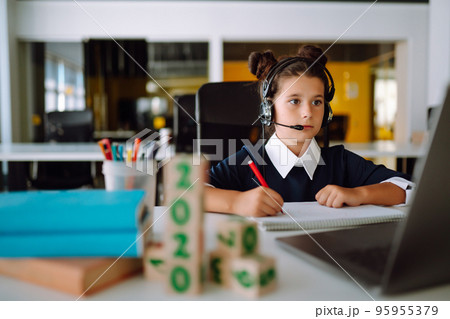 Homeschooling during quarantine. Online remote learning. Covid-2019. 95955379