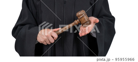 Faceless female judge in a robe holding a court gavel. Faceless female judge in a robe holding a court gavel. 95955966