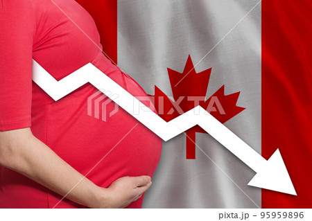 Canadian pregnant woman on Canadian flag background. Falling fertility rate in Canada Canadian pregnant woman on Canadian flag background. Falling fertility rate in Canada 95959896