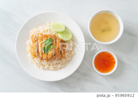 Steamed Rice with Fried Chicken or Hainanese Chicken Rice Steamed Rice with Fried Chicken or Hainanese Chicken Rice 95960912