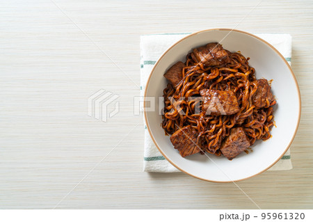 Jjapaguri or Chapaguri, Korean Black Beans Spicy Noodles with Beef Jjapaguri or Chapaguri, Korean Black Beans Spicy Noodles with Beef 95961320