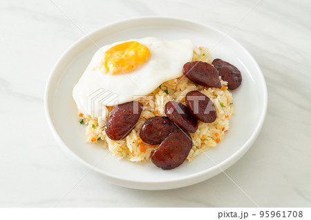 fried rice with fried egg and Chinese sausage fried rice with fried egg and Chinese sausage 95961708