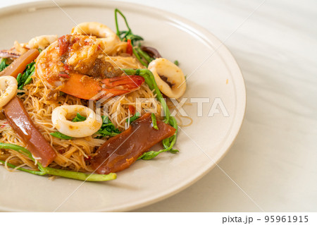 Stir-fried rice vermicelli and water mimosa with mix seafood Stir-fried rice vermicelli and water mimosa with mix seafood 95961915
